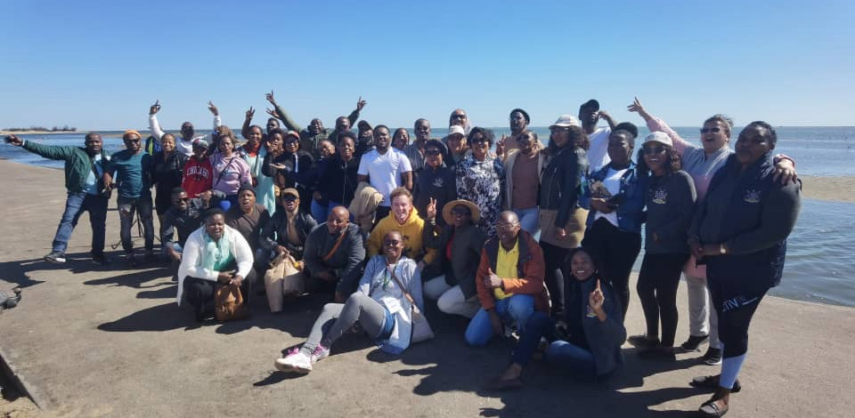 Roadshow participants on a Zanzibar beach visit